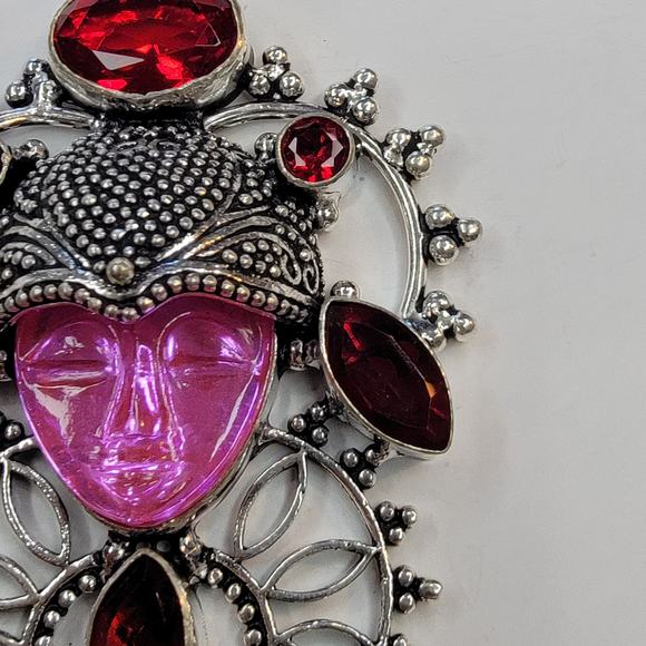Sterling Silver Pendant with Pink Carved Face and Garnet Accents - Picture 5 of 10